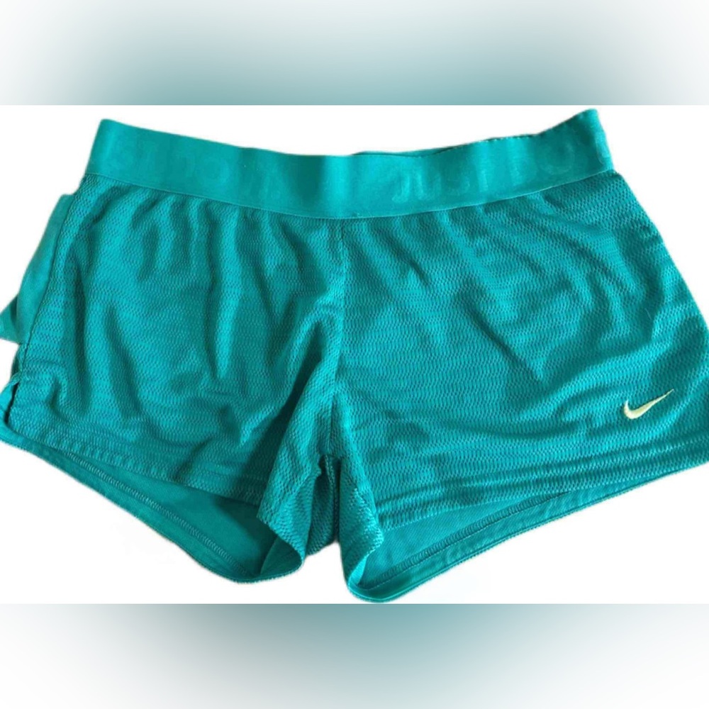 Women’s teal nike dri-fit running shorts size medium